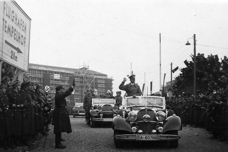 Adolf Hitler leaves Berlin Tempelhof Airport after his arrival from Vienna just after the Anschluss
